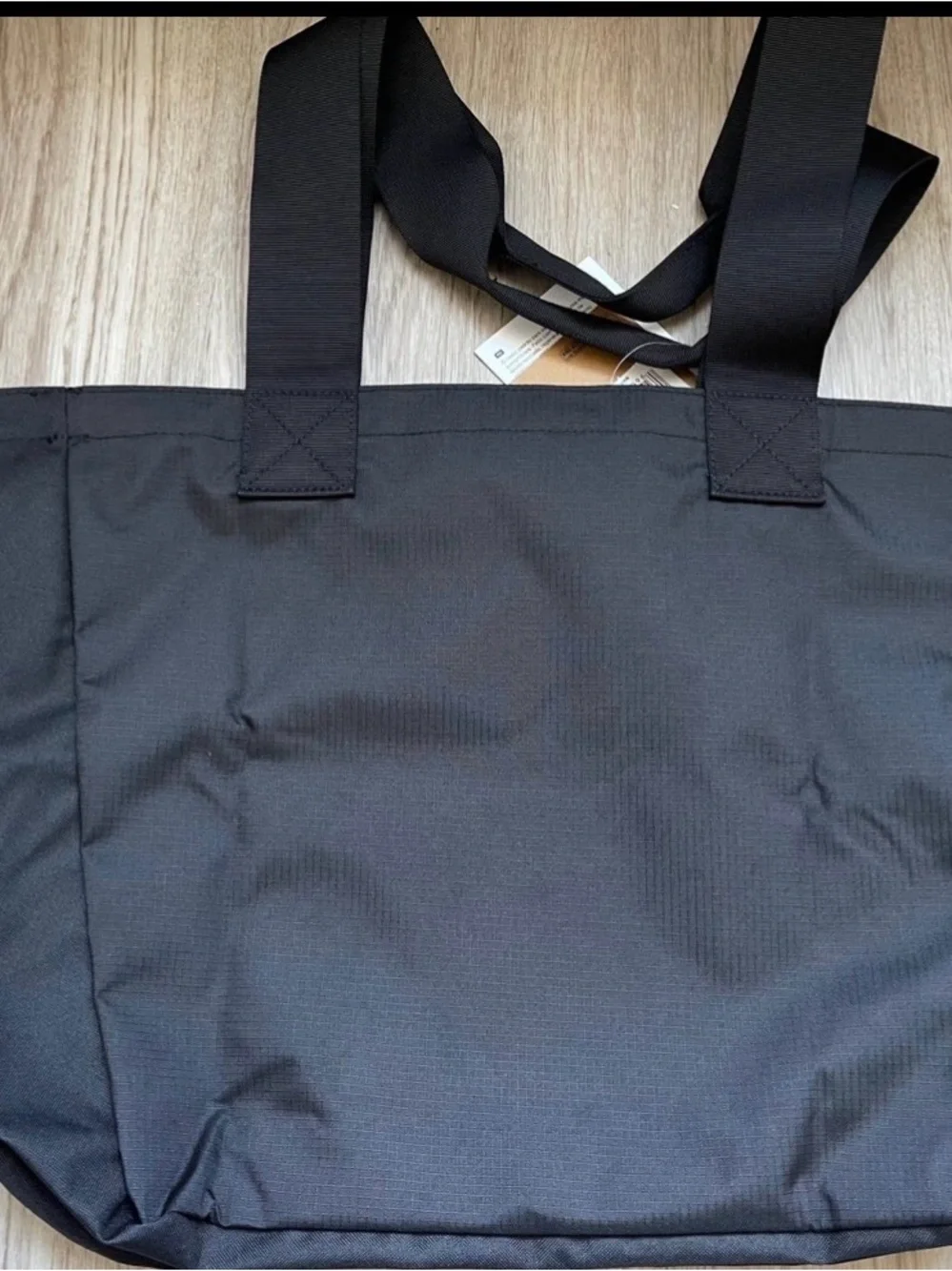 The North Face EWC SmallTote Bag. New, with tags. 100% Polyester. Color- Black